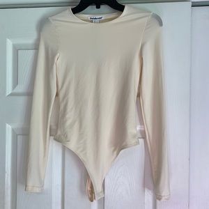 Brand New Charlotte Russe Cream Color Long Sleeve Bodysuit